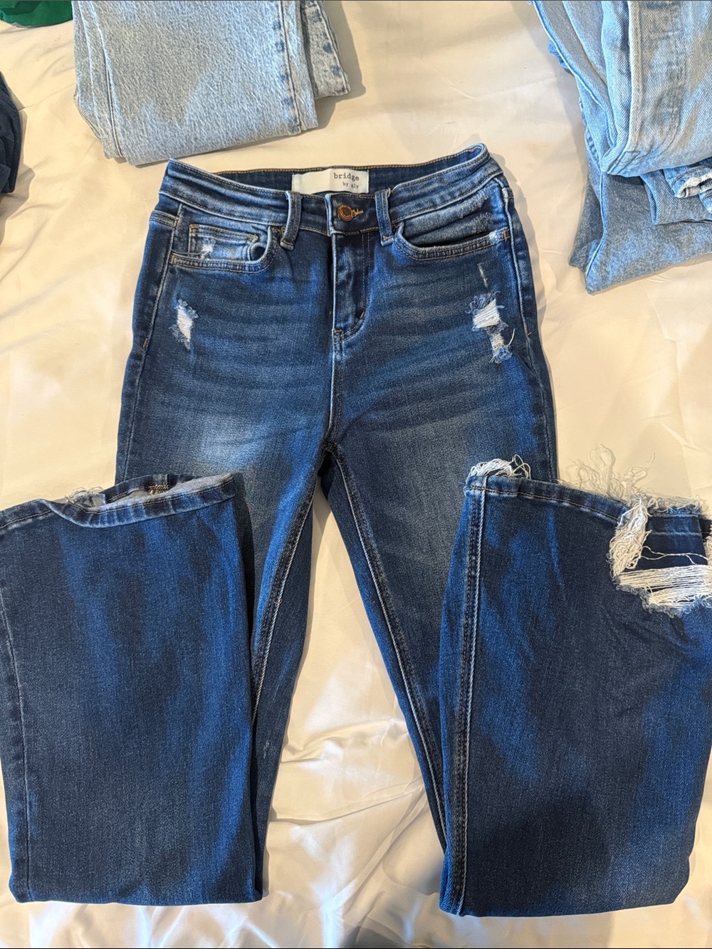 High-Rise Distressed Women's Jeans in Dark Blue